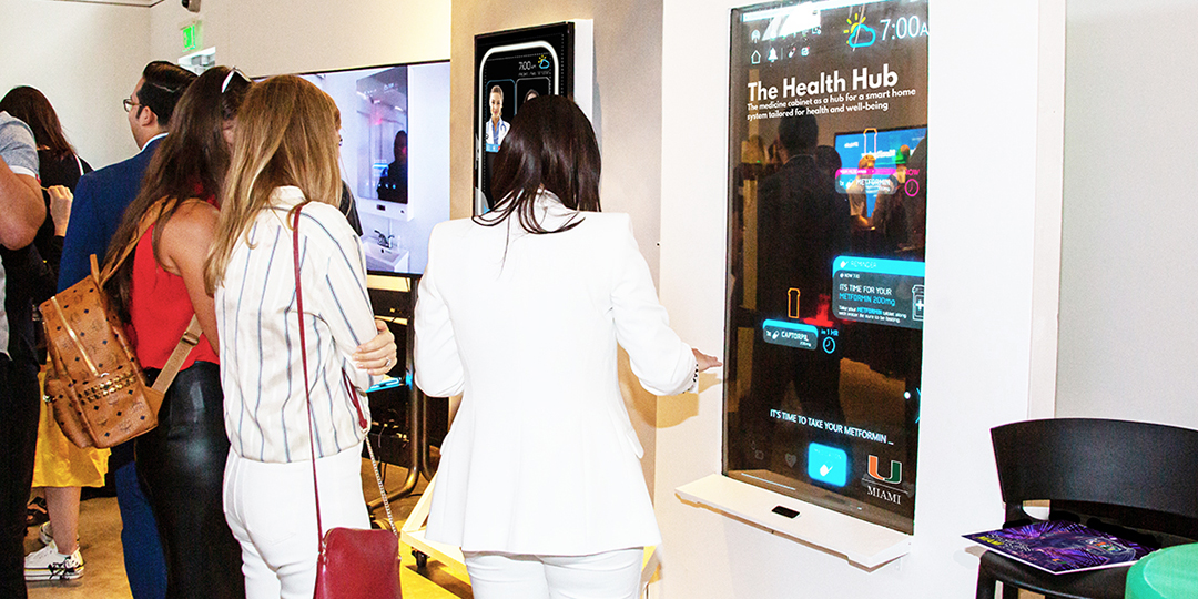 Smart Cities MIAMI Conference attendees view the Health Hub exhibit